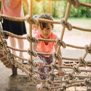 child with rope ladder