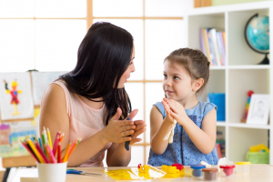 mother and daughter learning at home