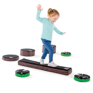 toddler using balance beam