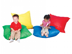 two students reading on beanbag pillows