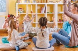 Teacher and students stretching
